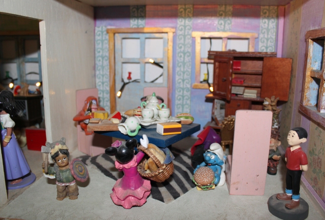 messy dining room in dollhouse